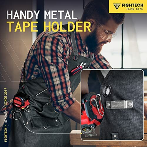 Man using a handy metal tape holder attached to an apron.